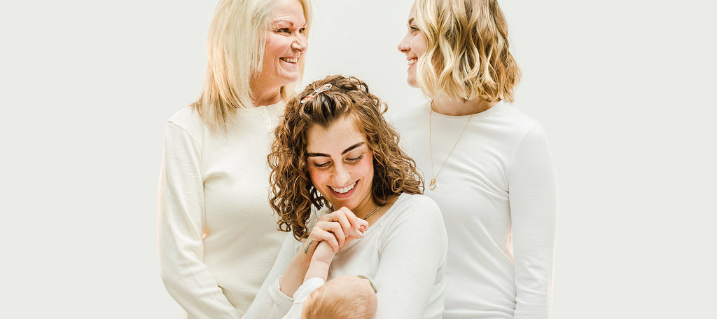 Image of three women, older middle aged and younger.