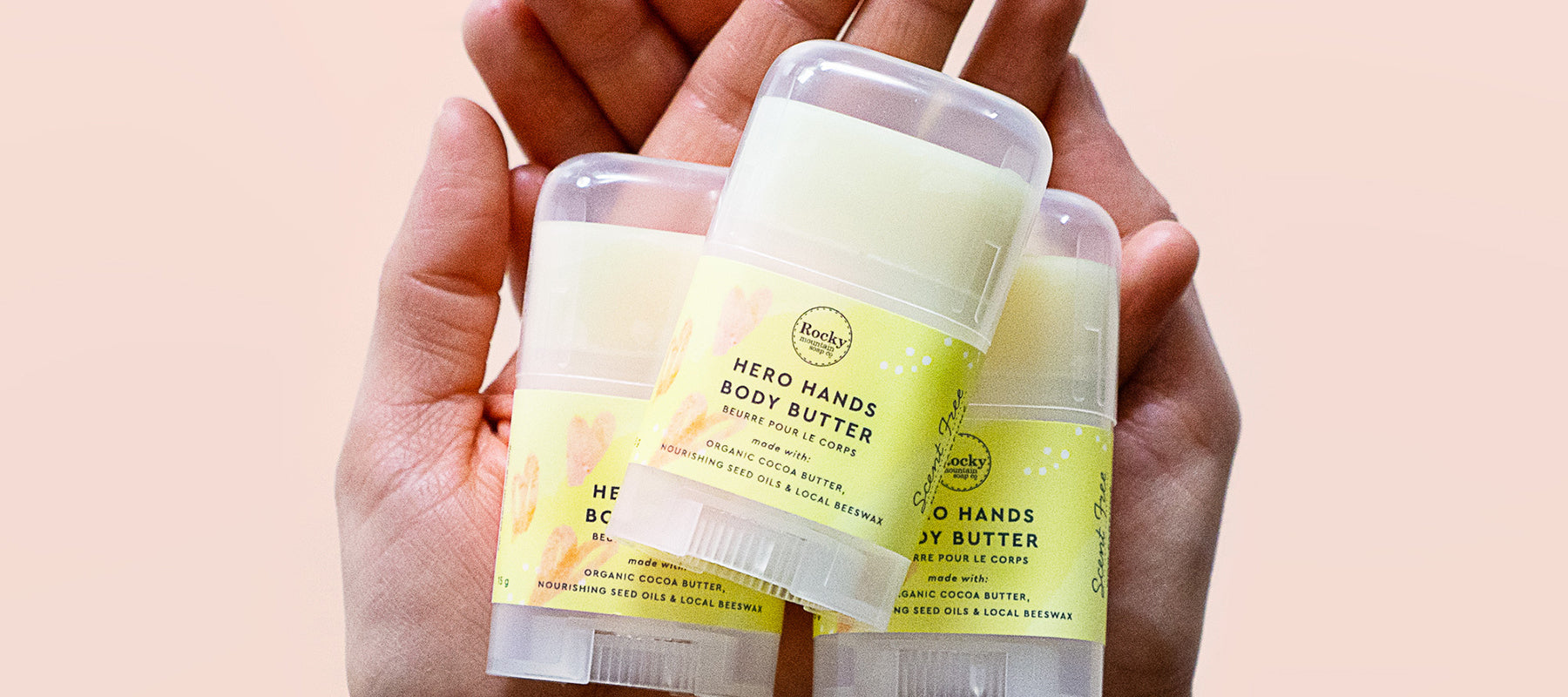 hand holding Hero Hands community dry skin butter donation to Alberta hospitals. 