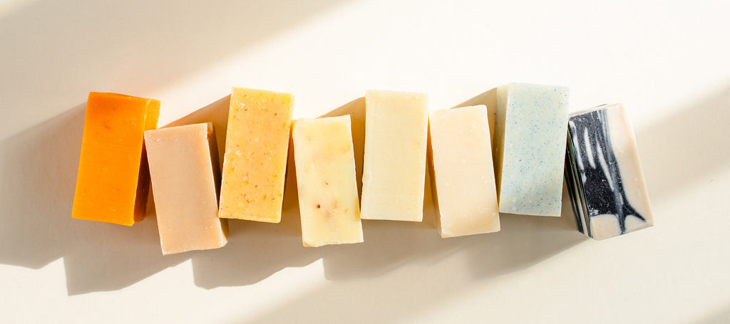 row of natural bar soaps.