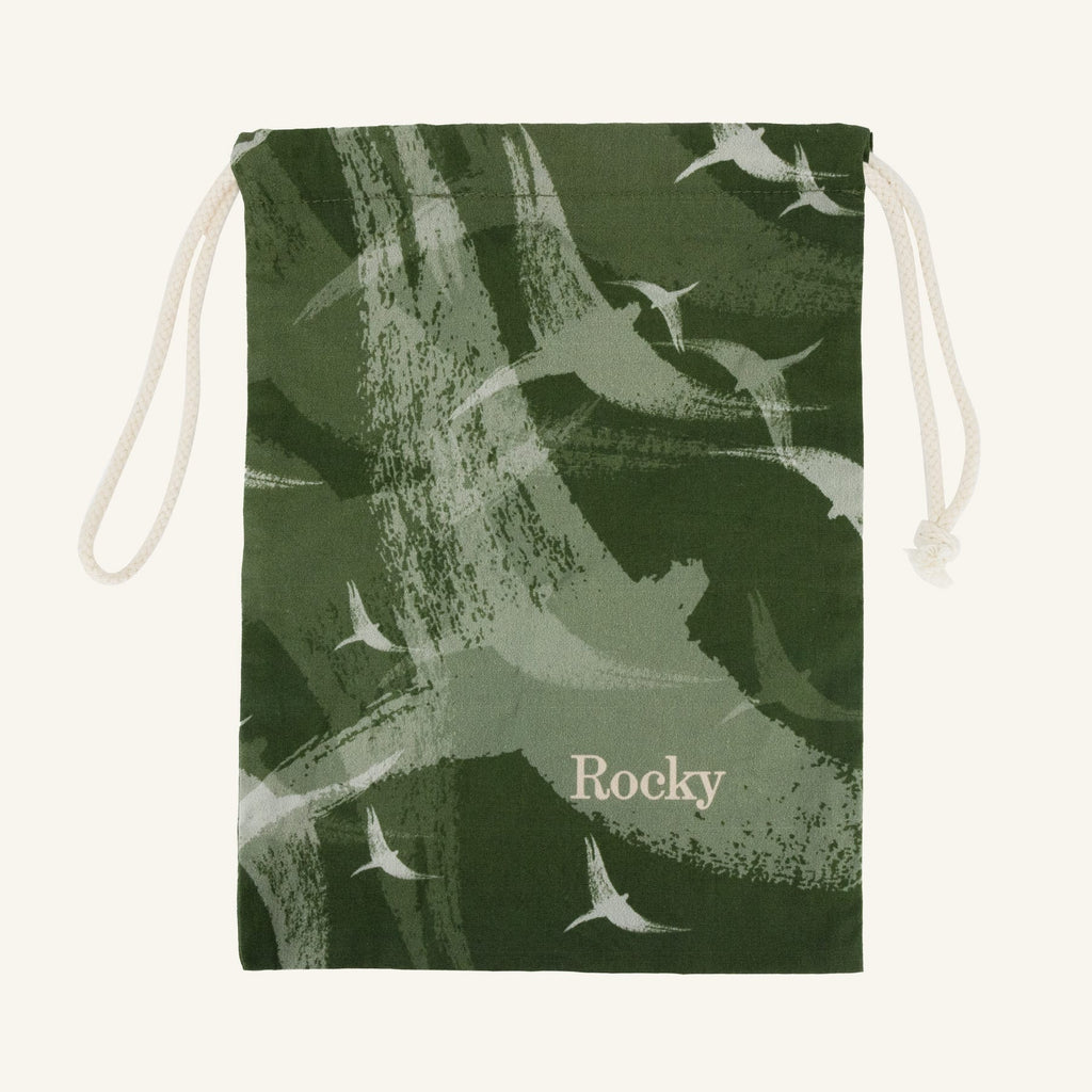 Large green drawstring bag with bird pattern and 'Rocky' branding on a white background