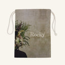 Large drawstring bag with floral design and 'Rocky' branding on a beige background