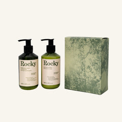 The Perfect Pair | Lemongrass set featuring two pump bottles of soap and lotion next to their matching green decorative gift box.