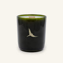 Moonlight Candle in a dark green glass vessel with a gold bird illustration and a wooden wick.