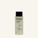 A 90ml bottle of Rocky Wild Kindness Conditioner in scent free on a cream background