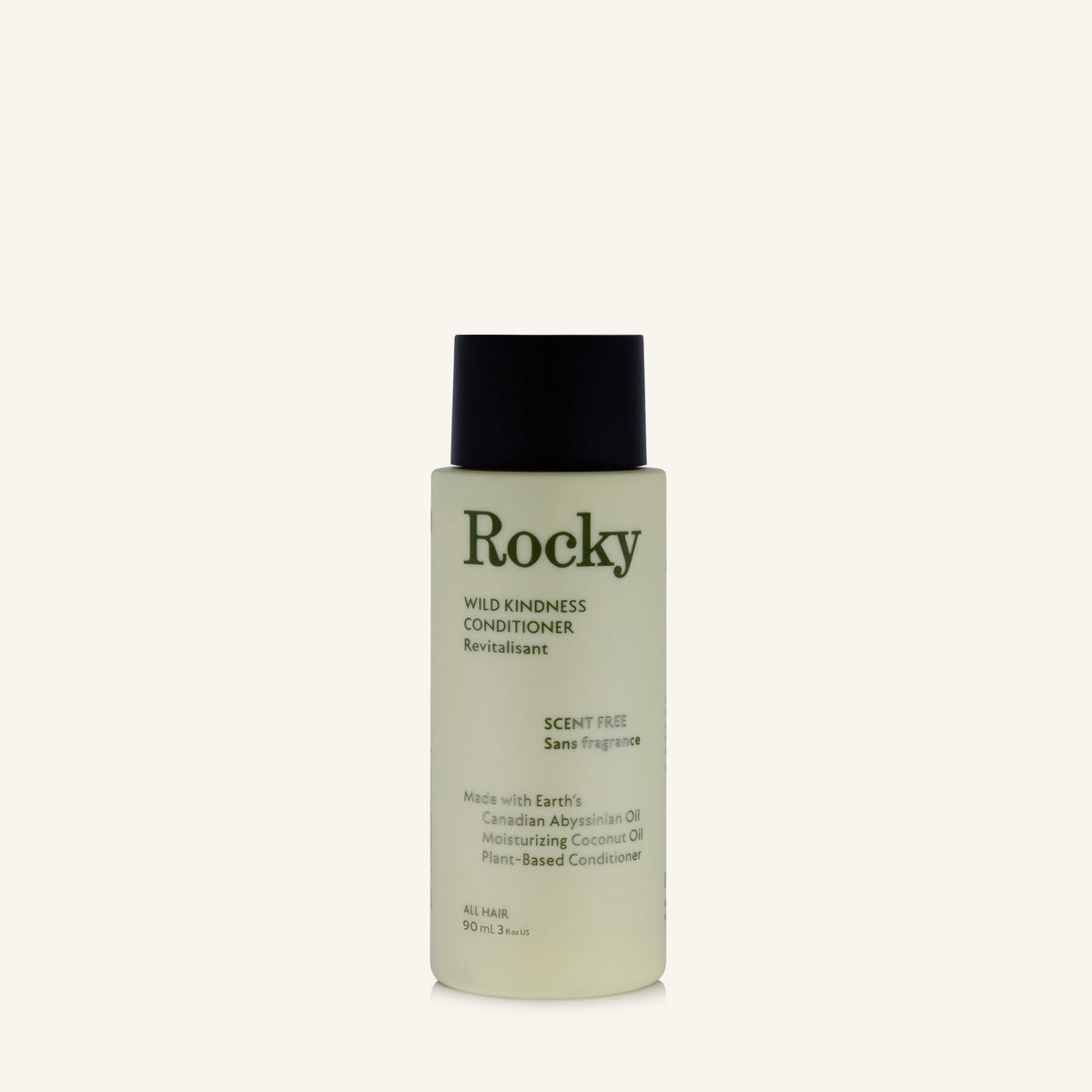 A 90ml bottle of Rocky Wild Kindness Conditioner in scent free on a cream background