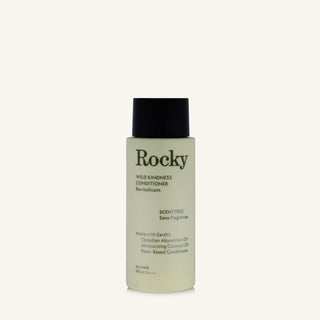 A 90ml bottle of Rocky Wild Kindness Conditioner in scent free on a cream background