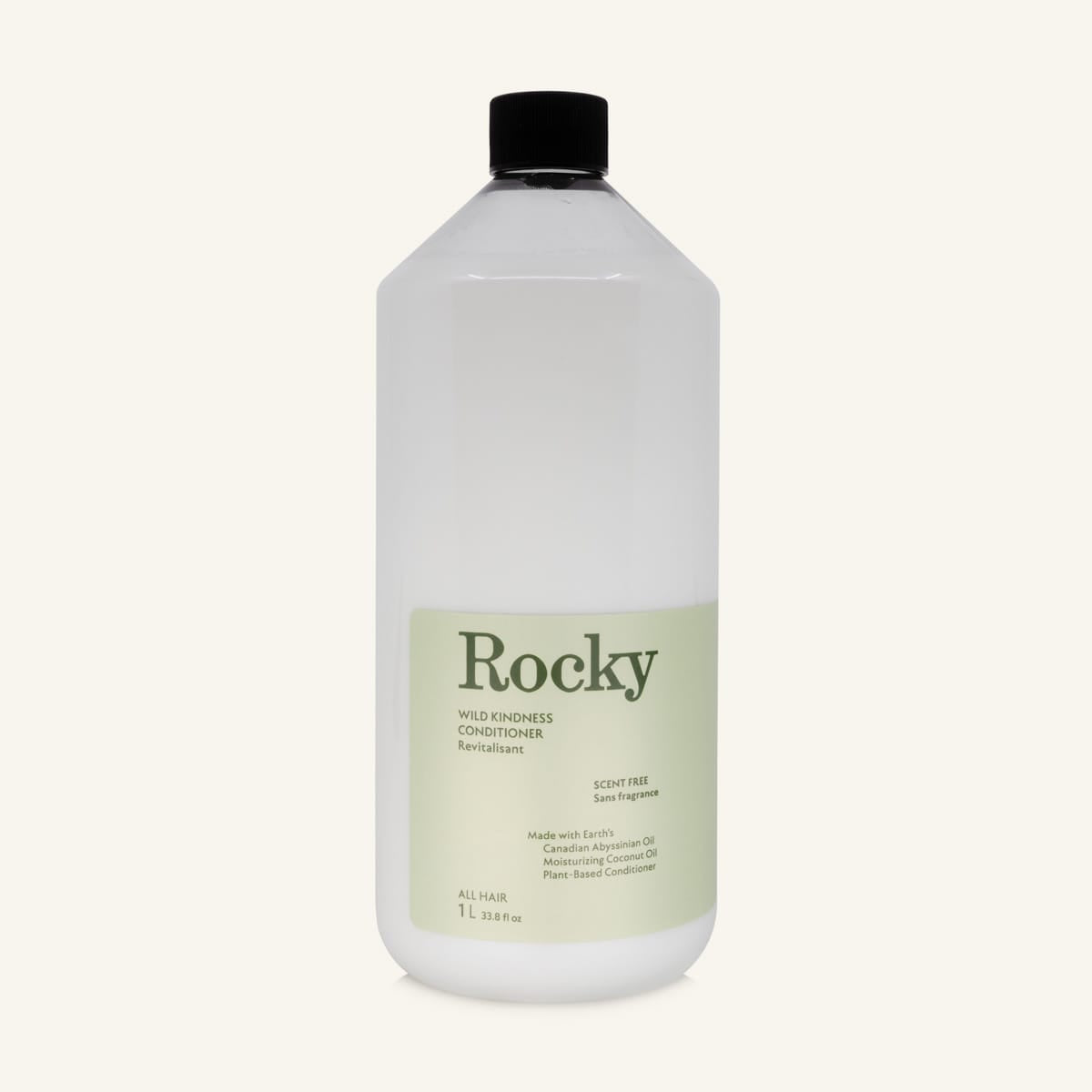 A 1L bottle of Rocky Wild Kindness Scent Free Conditioner with a black cap and a pale green label, centered on a light cream background.
