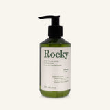 Dark green bottle of Rocky Mountain Soap Company Lavender Everything Wash with a black pump dispenser.