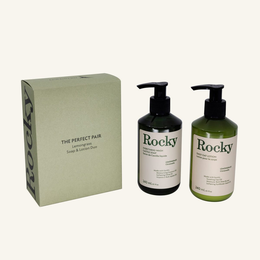 The Perfect Pair gift set in lemongrass scent featuring a beige box and two pump bottles (Rocky everything wash and oat body lotion) in black and green, on a light cream background.