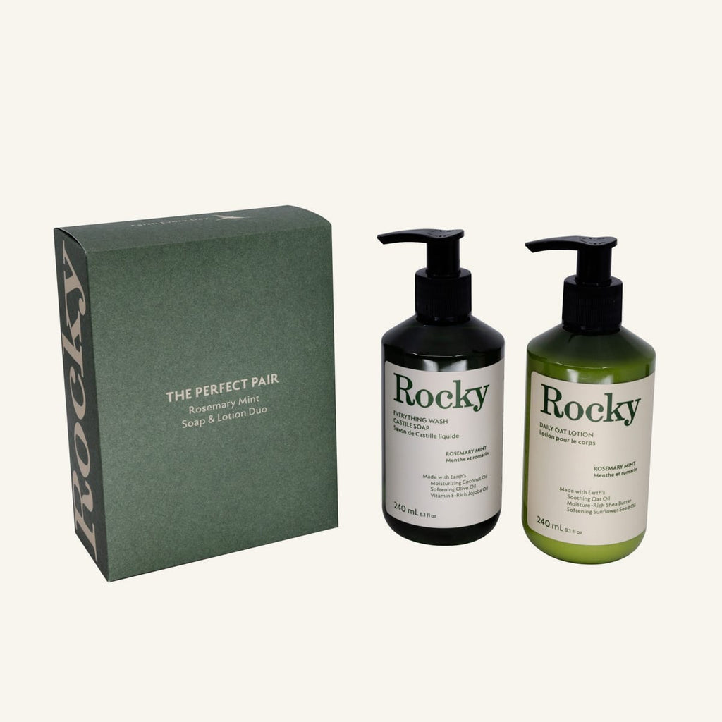 The Perfect Pair gift set in rosemary mint scent featuring two pump bottles (Rocky everything wash and oat body lotion) in black and green, on a light cream background.
