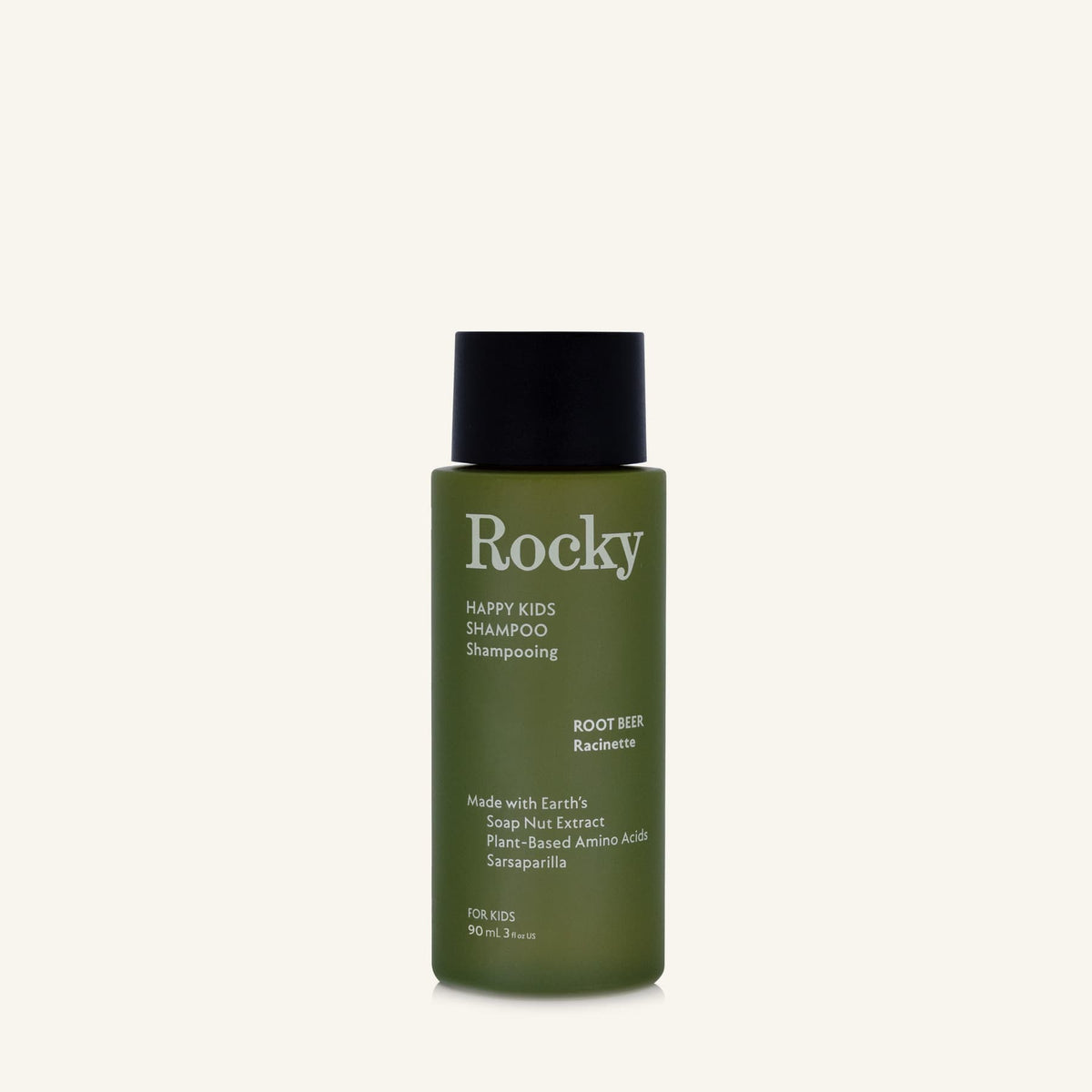 A 90ml bottle of Rocky Happy Kids Shampoo in Root Beer, featuring an olive green bottle and a black cap, centered on a light cream background.