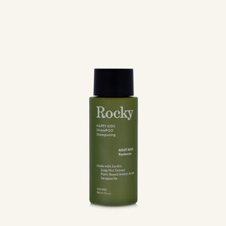A 90ml bottle of Rocky Happy Kids Shampoo in Root Beer, featuring an olive green bottle and a black cap, centered on a light cream background.