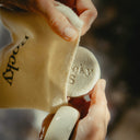 Travel pouch with shampoo bar