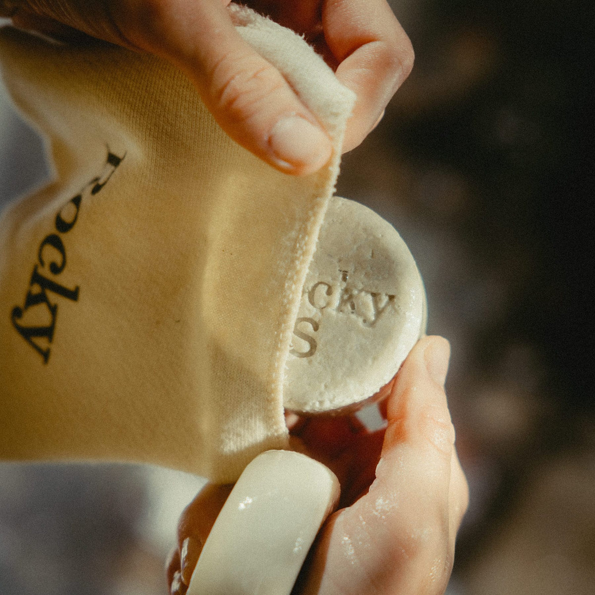 Travel pouch with shampoo bar
