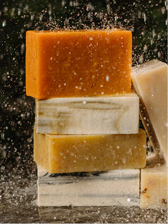A stack of Rocky bar soaps in a spray of water