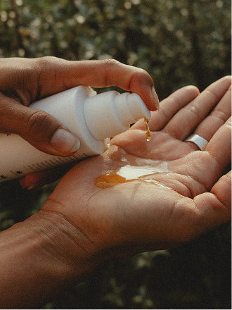 Cleansing oil pumped into an open palm