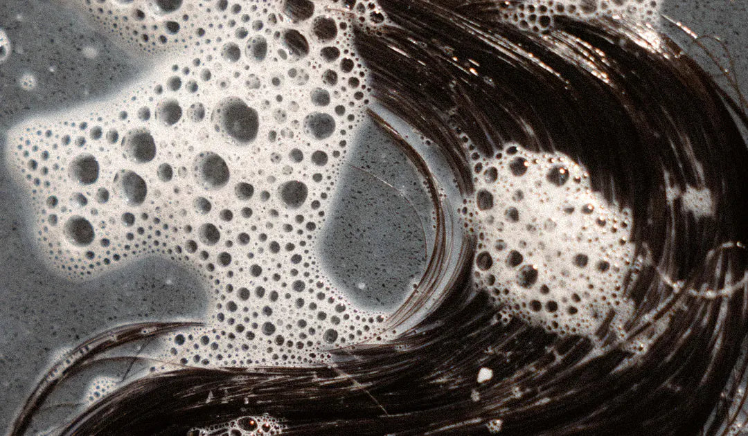 Lather worked through wet hair, close up